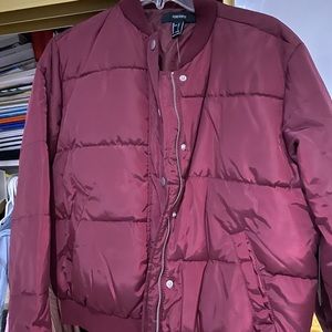 Forever 21 woman’s burgundy bomber jacket